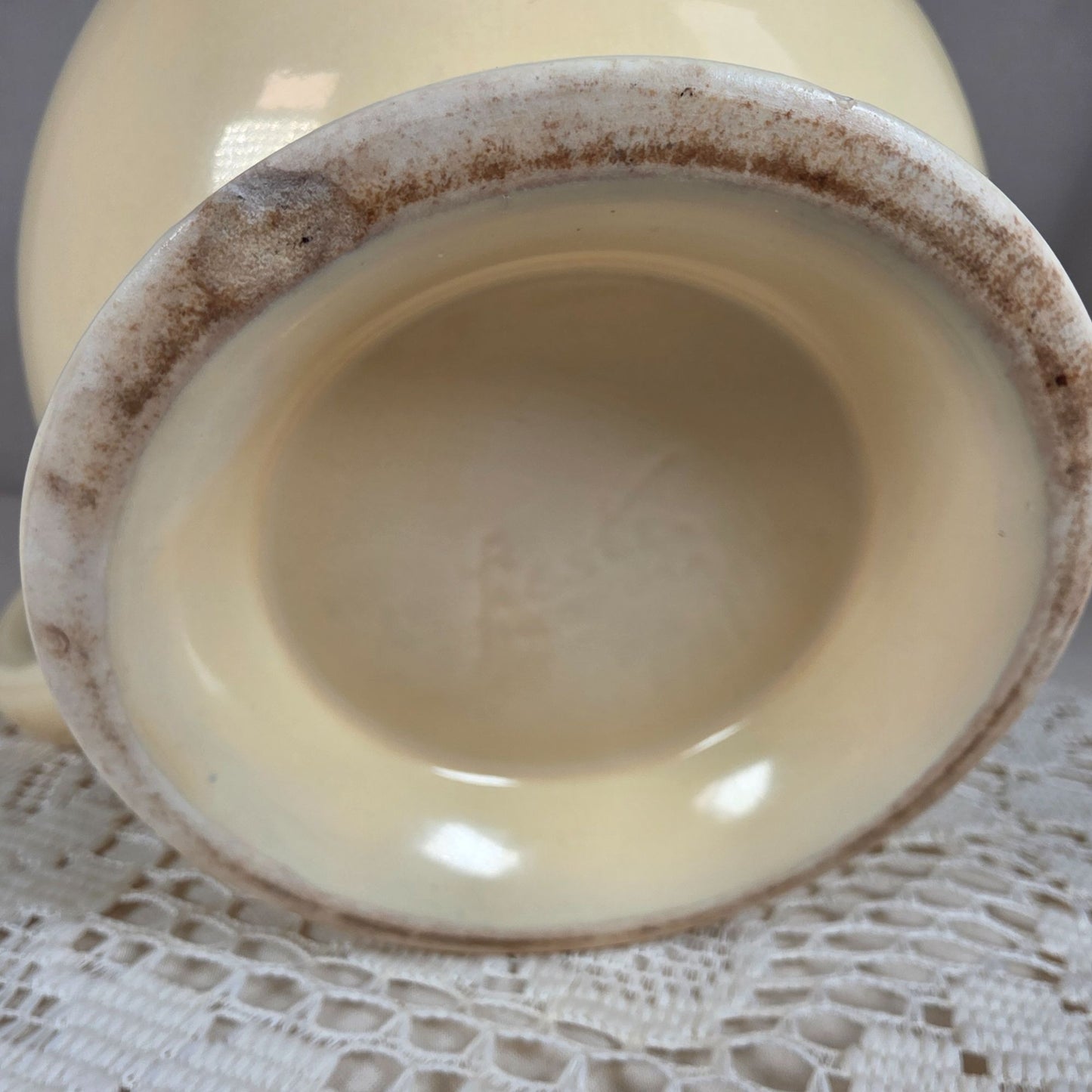 Vintage Fiesta Ivory Ice Lip Pitcher 9 1/2" Wide 7" Tall With Minor Chips On Base Edge