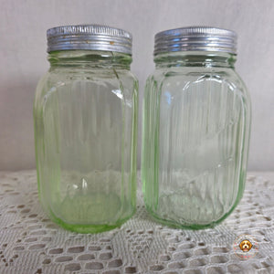 Vintage green uranium Glass Salt Pepper Shakers UV Glow Ribbed metal lids