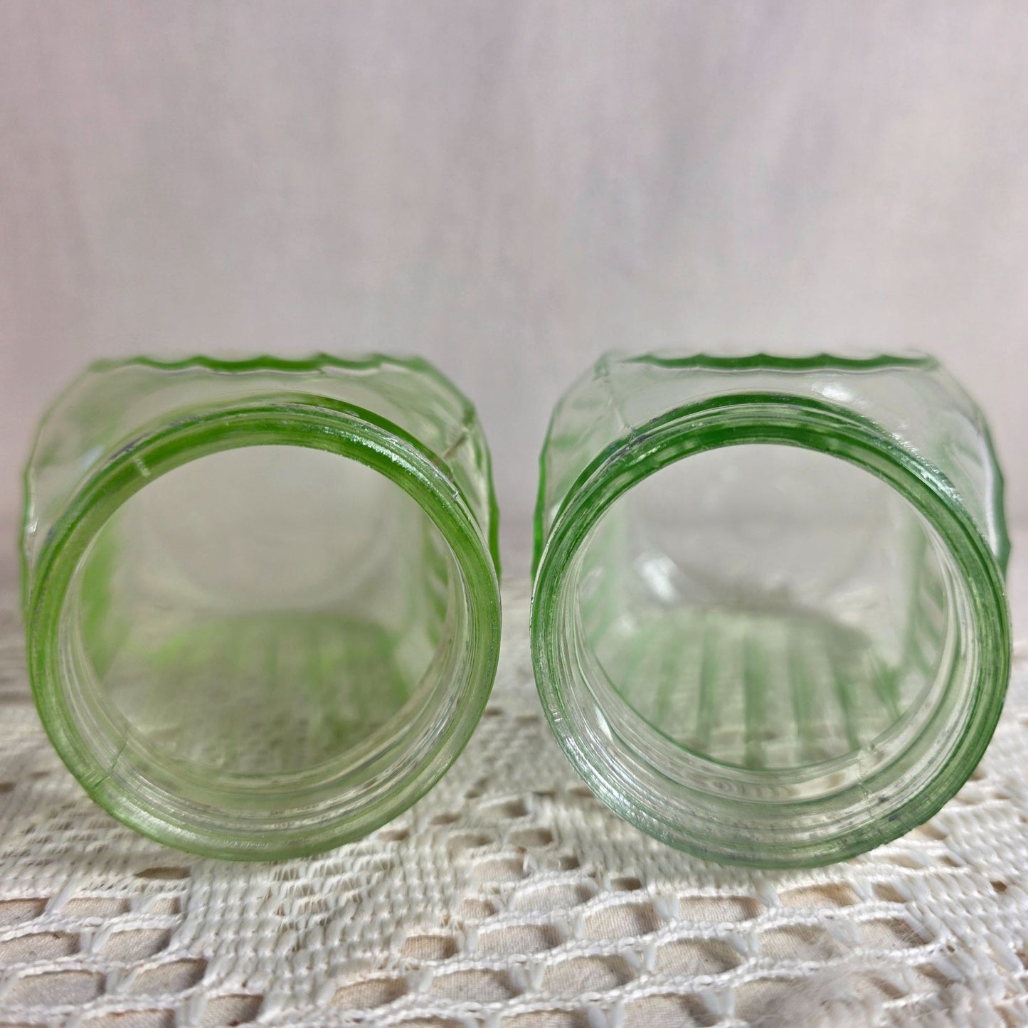 Vintage green uranium Glass Salt Pepper Shakers UV Glow Ribbed metal lids