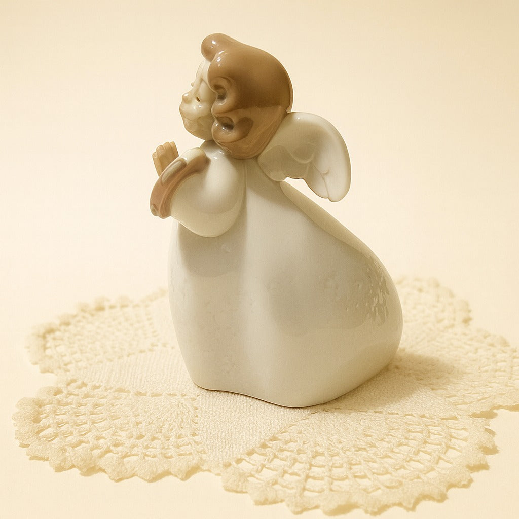 Lladro Little Angel with Tambourine 6530 • Jose Puche • 1998–2003 • 5” Porcelain