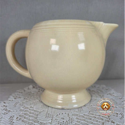 Vintage Fiesta Ivory Ice Lip Pitcher 9 1/2" Wide 7" Tall With Minor Chips On Base Edge
