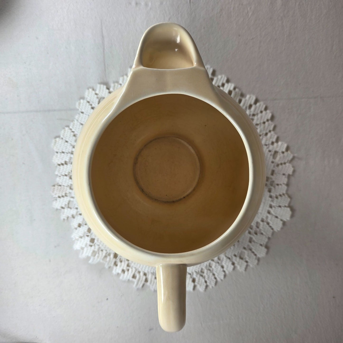 Vintage Fiesta Ivory Ice Lip Pitcher 9 1/2" Wide 7" Tall With Minor Chips On Base Edge
